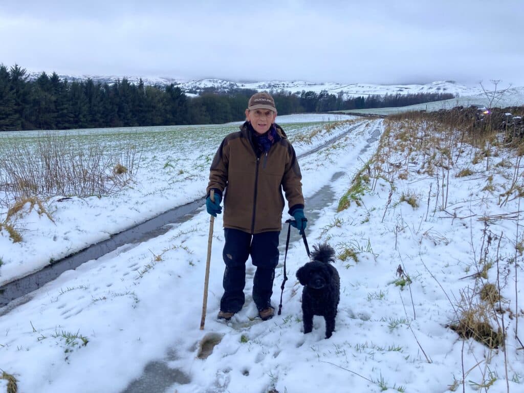 A photo or Philip Lord on his walking challenge with his dog Freddie, who have raised over £5000 for charity and walked over 500 miles. 