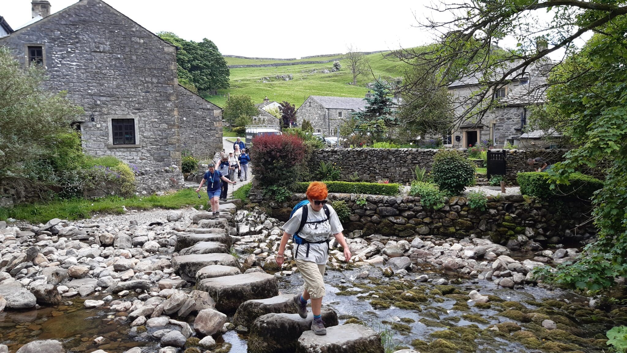 
Walkers crossing the stepping stones at Stainforth, North Yorkshire as part of a guided walk. This photo is for the Big River Ramble. 