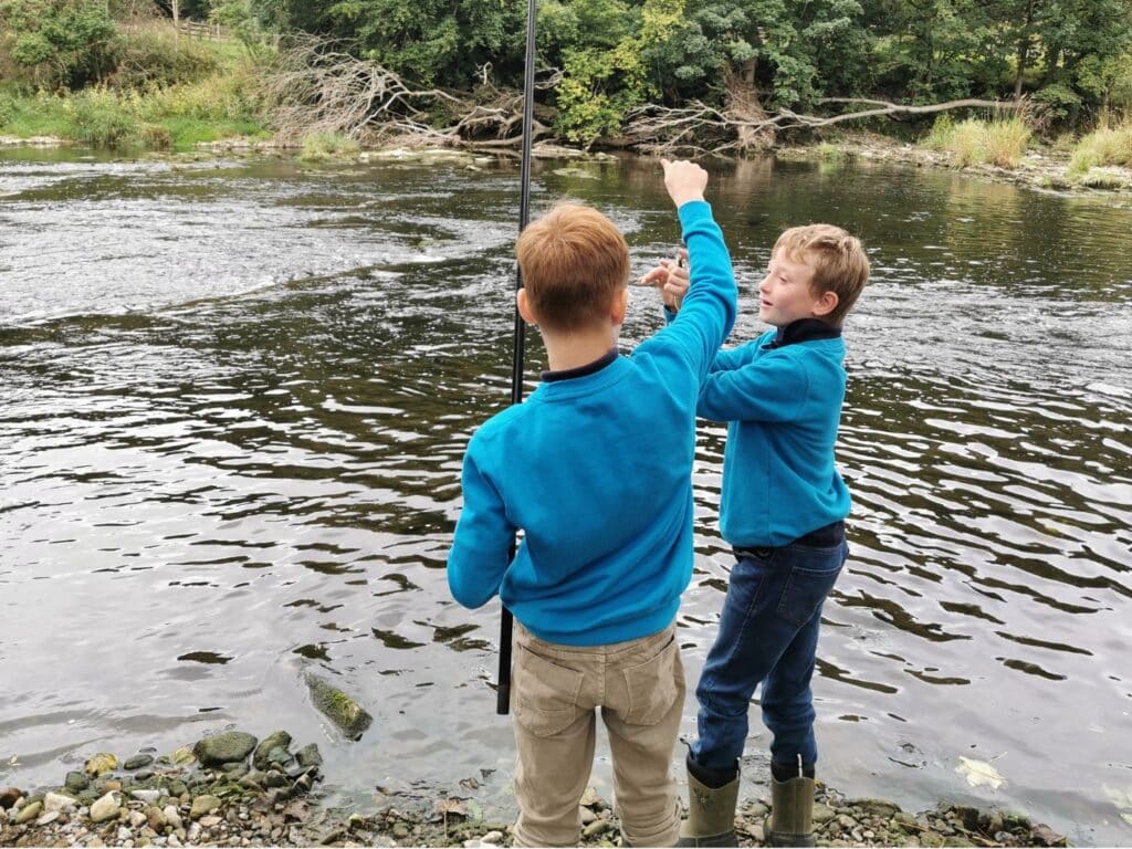 Young people at the start of their fishing journey! Our school sessions are designed to spark a love of angling.