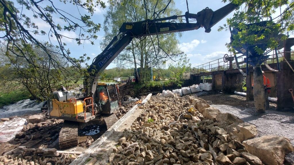 Our contractors creating the fish pass at Gathurst weir. 