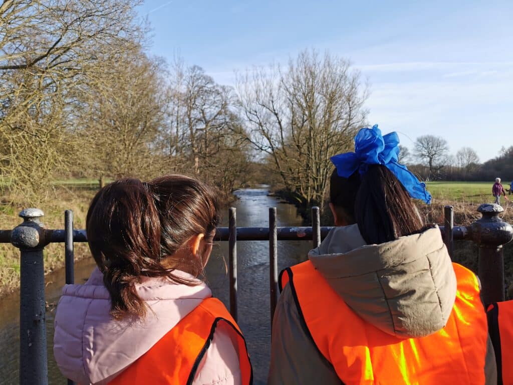 Pupils visiting their local river as part of an outdoor education session.