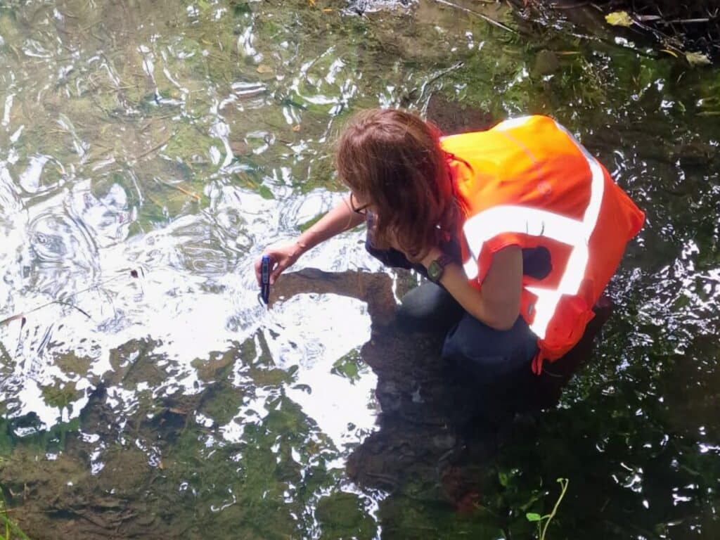 A volunteer collecting citizen science data on a riverblitz